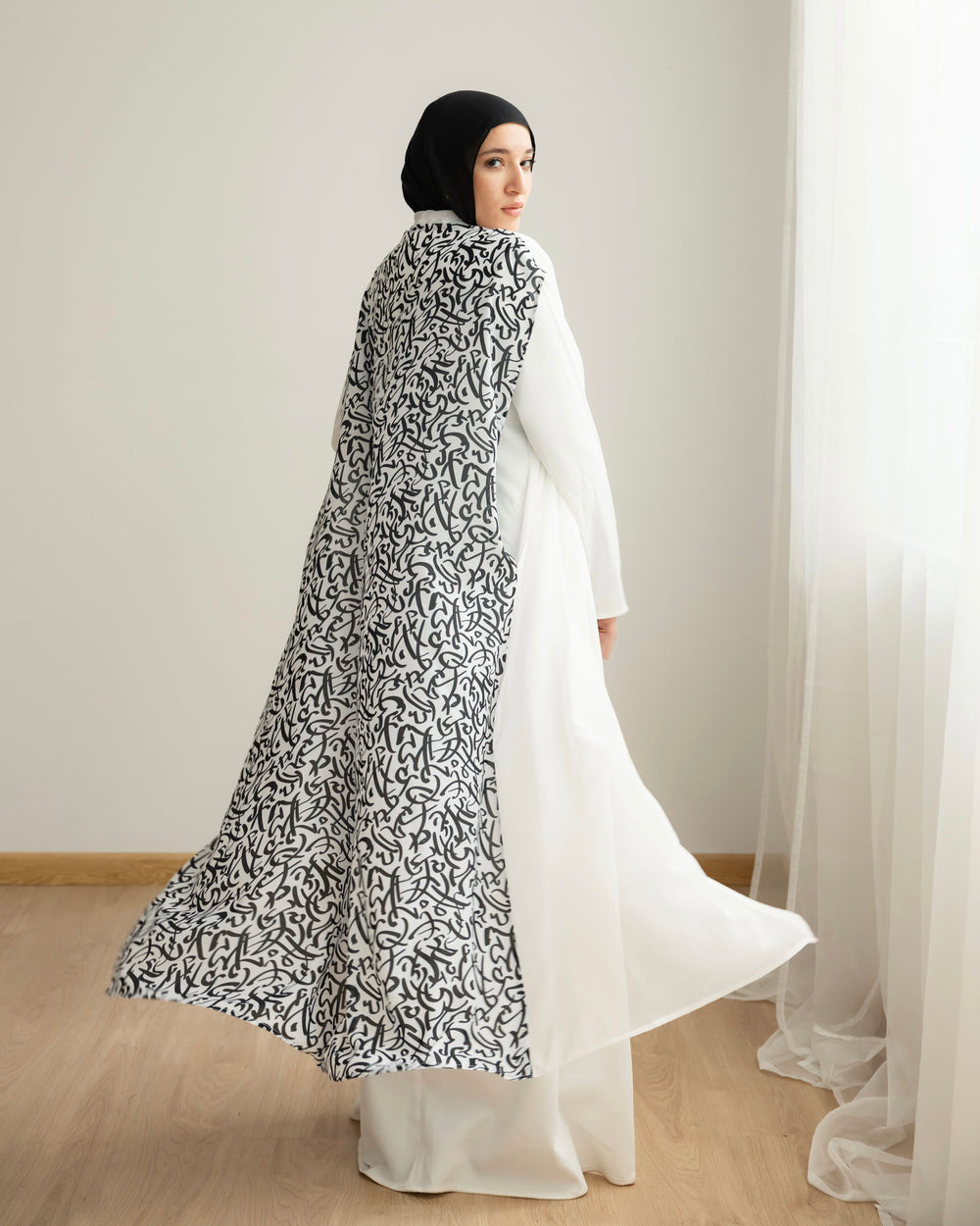 The Calligraphy Off White Cape C512